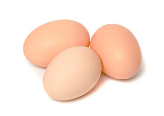 Three eggs isolated on white background