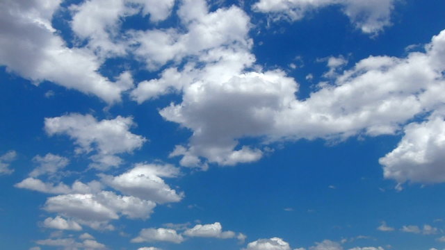 HD White clouds in a blue sky, timelapse