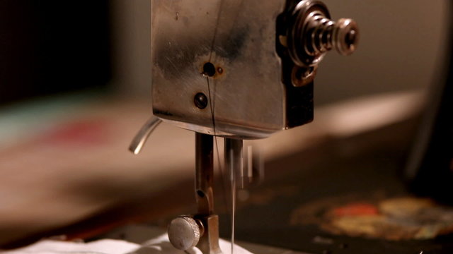 Pan on stiching mashine close-up
