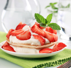 Pancakes with curd cheese and strawberries