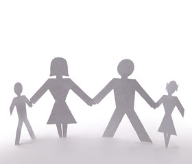 Cutout people family of four standing holding hands