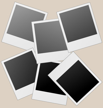 Realistic vector photo frames isolated on brown.