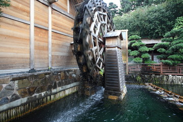 wooden waterwheel rotating