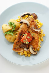 carp on organic potato and healthy vegetable