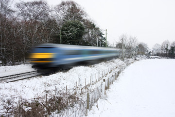 Naklejka premium train running in the snow
