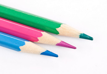 Colorful pencils on white background
