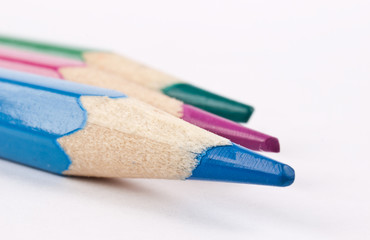 Colorful pencils on white background
