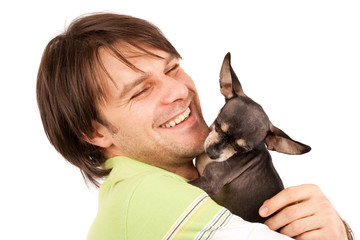 Young man with his chihuahua