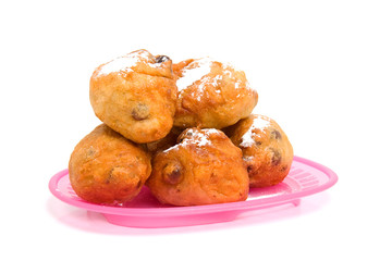 Dutch donut also known as oliebollen over white background