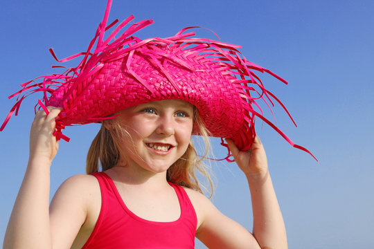 Child On Vacation In Sun Hat