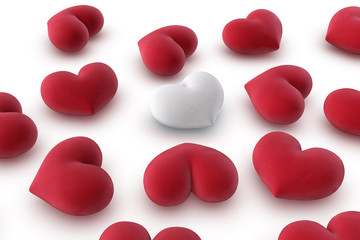 one white heart among several red hearts