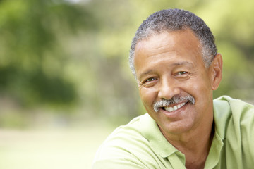 Portrait Of Senior Man In Park