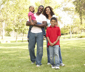 Family Enjoying Walk In Park