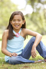 Portrait Of Young Girl In Park