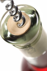 Opening a bottle of red