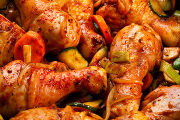 Roasted chicken drumsticks and vegetables