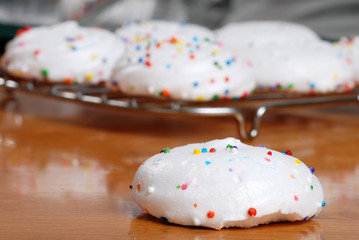 closeup of meringue cookie on wooden table