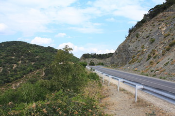 Fototapeta na wymiar Paved road in the mountains