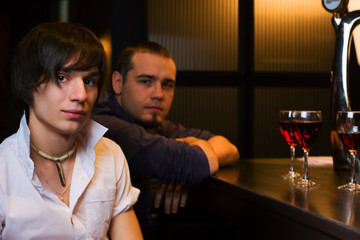 Young men relaxing in a bar.