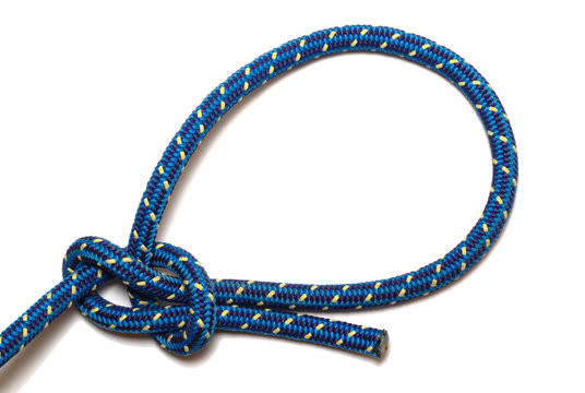 Bowline knot made of a blue-yellow rope, isolated