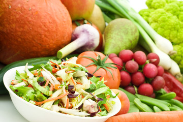 fresh salad on vegetarian background