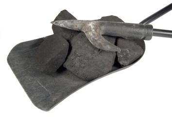 poker and shovel with coal on white background