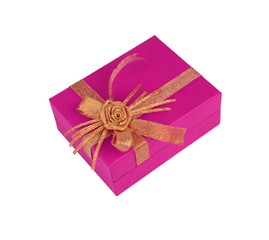 Pink gift box with golden bow on white background