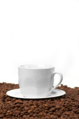 Fototapeta premium Cup , costing on coffee grain