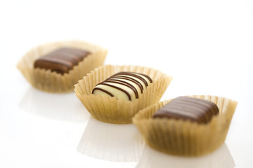 Belgian chocolates on a white background