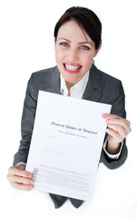 Portrait of a smiling woman holding a contract