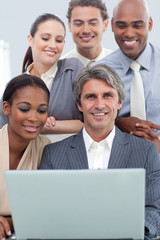 Fototapeta premium Positive International business people using a laptop