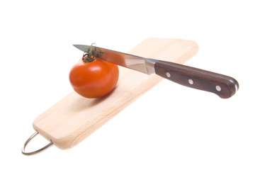 Tomatoes on cutting board