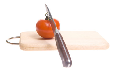 Tomatoes on cutting board