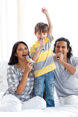 Animated family singing with microphones