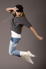 Young women jumping during her dance