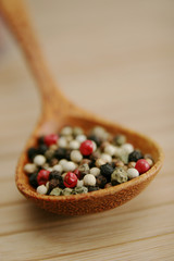 Mixed pepper in a spoon