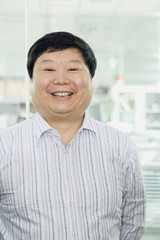 Obraz premium Businessman Smiling at Camera