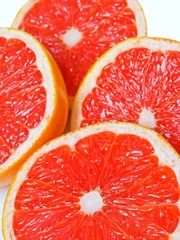 Poster Rode sappige grapefruitschijfjes © Landysh
