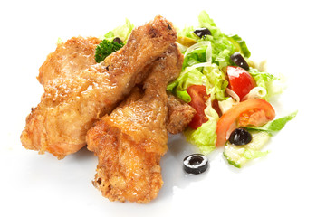 Chicken legs with fresh vegetables