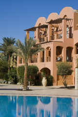 Naklejka premium Swimming pool on a sunny day. Hurghada city in Egypt.