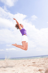 Obraz premium jumping on the beach