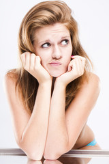 The young funny girl isolated on a white background