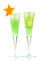Mint Champagne alcohol cocktail with orange star and lime slice