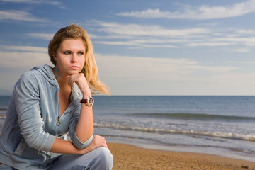 Fototapeta na wymiar Woman by the sea