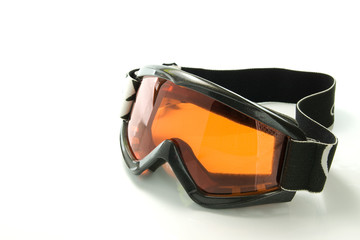 Orange snowboarding glasses on white background