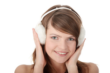 Pretty young teen girl wearing white earmuff