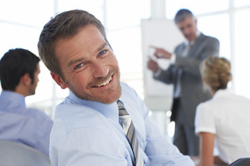 Happy businessman close up