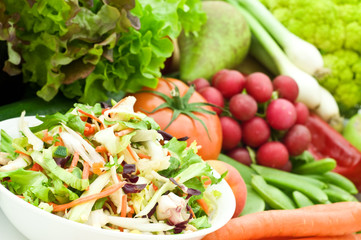 fresh salad on vegetarian background