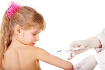 Doctor does inoculation to child. Isolated.