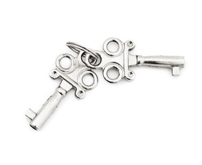 Two silver keys on a white background